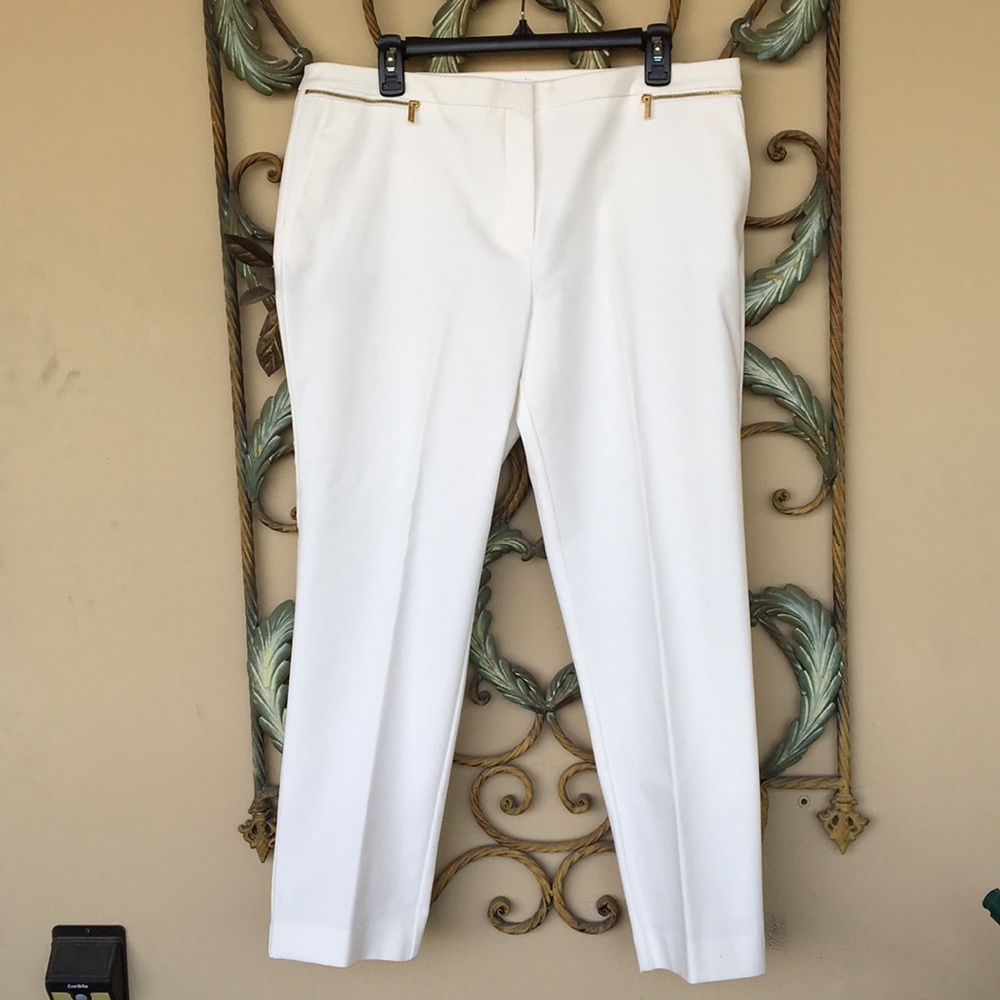 New , gold zippers, side pockets